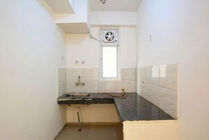 Kitchen in 2 BHK Apartment at Ajnara Homes, Sector 16b Greater Noida – for Sale