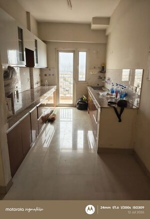 Kitchen in 2 BHK Apartment at Paramount Golf Foreste Apartments, Zeta I Greater Noida – for Rent