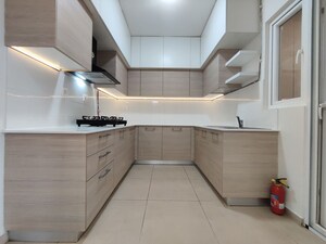 Kitchen in 2 BHK Apartment at Bhartiya Nikoo Homes Phase 2, Thanisandra Main Road – for Rent