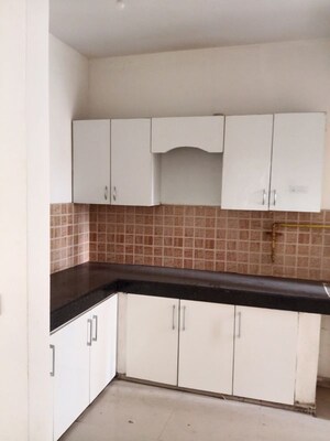 Kitchen in 3 BHK Apartment at Mahagun My Woods, Sector 16c Greater Noida – for Rent