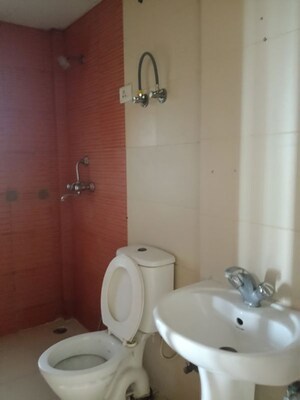 Bathroom in 3 BHK Apartment at Mahagun My Woods, Sector 16c Greater Noida – for Rent