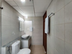 Bathroom in 2 BHK Apartment at Bhartiya Nikoo Homes Phase 2, Thanisandra Main Road – for Rent