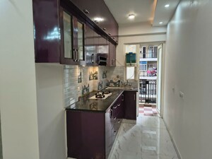 Kitchen in 2 BHK Apartment at Casa Woodstock, Sector 16c Greater Noida – for Sale