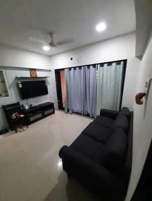Living Room in 1 BHK Apartment at Lalani Grandeur, Goregaon East – for Rent