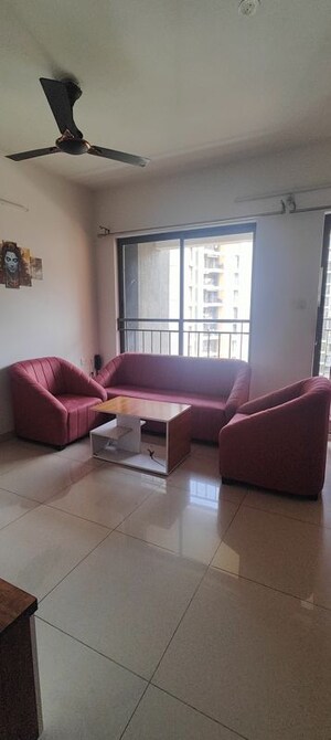 Living Room in 1 BHK Apartment at Shapoorji Pallonji Joyville Hinjewadi, Hinjewadi – for Rent