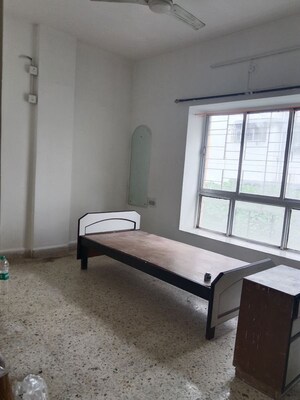 Bedroom in 2 BHK Apartment at Suvarnayug Loksangam Vihar, Aundh – for Rent