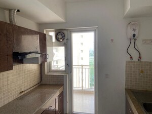 Kitchen in 3.5 BHK Apartment at Emaar Gurgaon Greens, Sector 102 – for Sale