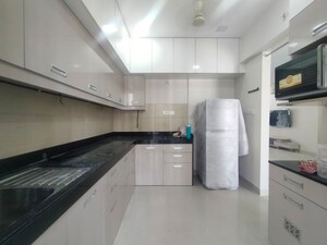 Kitchen in 3 BHK Apartment at Lodha Luxuria, Majiwada – for Rent