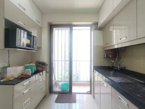 Kitchen in 3 BHK Apartment at Lodha Luxuria, Majiwada – for Rent