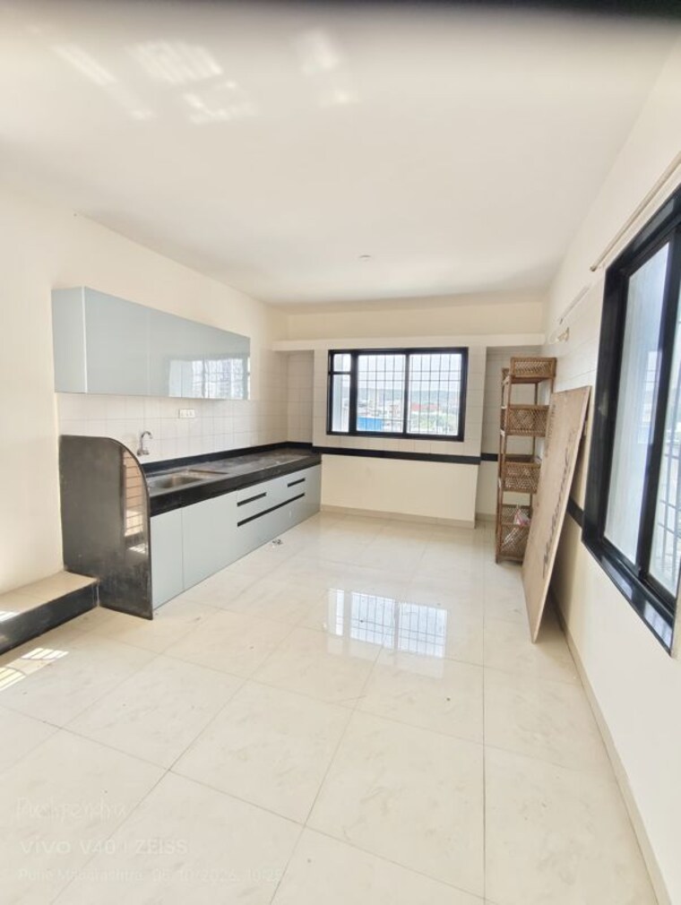 Kitchen, nikash-skies-chs 2 Bedroom 2000 Sq.Ft. Apartment In Pashan Pune 10612333