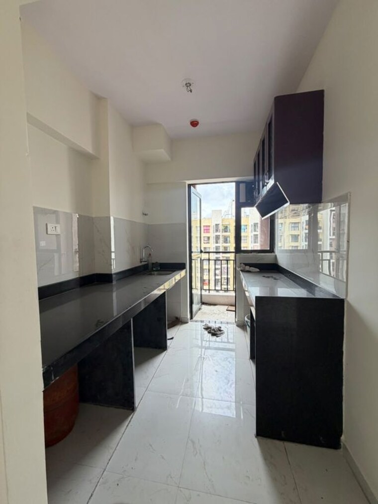 Kitchen, runwal-gardens 2 Bedroom 600 Sq.Ft. Apartment In Dombivli East Thane 10612348