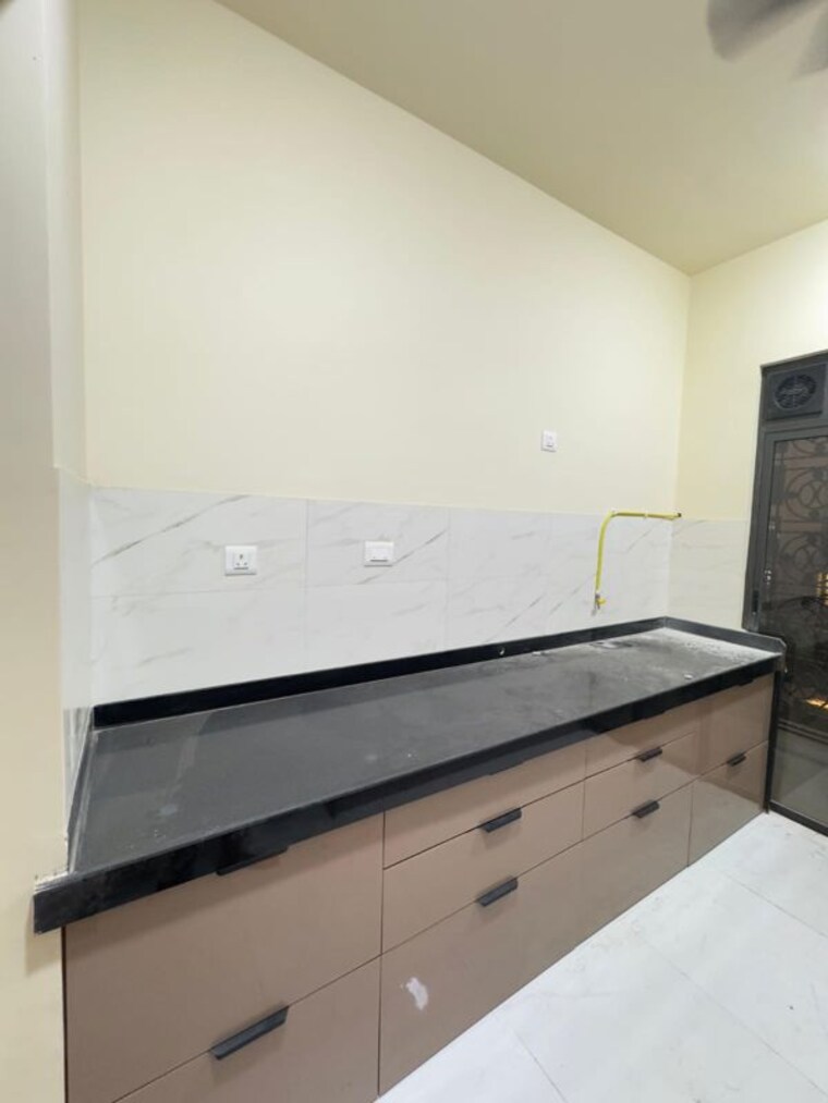 Kitchen, dhamji-shamji-mahavir-spring-tulip-phase-1 1 Bedroom 830 Sq.Ft. Apartment In Pokhran Road No Two Thane 10612397