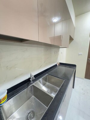 Kitchen in 1 BHK Apartment at Dhamji Shamji Mahavir Spring Tulip Phase 1, Pokhran Road No Two – for Rent