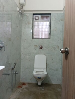 Bathroom in 2 BHK Apartment at Sadhana Bliss, Malad West – for Rent
