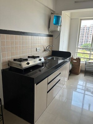 Kitchen in 2 BHK Apartment at Karia Konark Orchid, Wagholi – for Rent