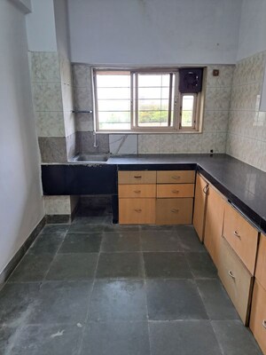 Kitchen in 2 BHK Apartment at Powai Cosmopolitan CHS, Powai – for Rent