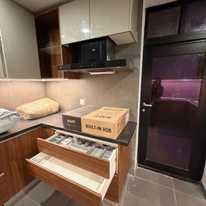 Kitchen in 3 BHK Apartment at Krisumi Waterfall Suites, Sihi – for Rent