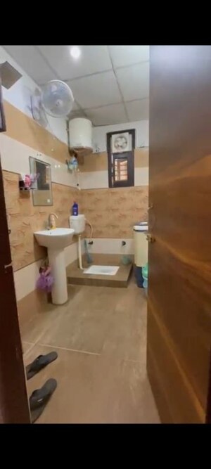 Bathroom in 3 BHK Builder Floor at Pratap Vihar – for Sale