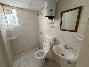 Bathroom in 2 BHK Apartment at MRG The Meridian, Sector 89 – for Rent