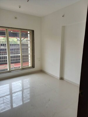 Room in 2 BHK Apartment at Shree Riddhi Siddhi Sumukh Hills, Kandivali East – for Rent