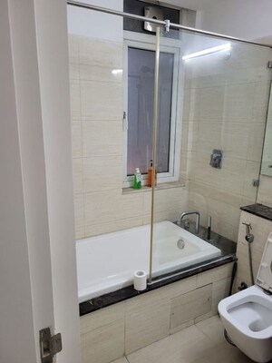Bathroom in 3 BHK Apartment at DLF The Primus, Sector 82a – for Rent