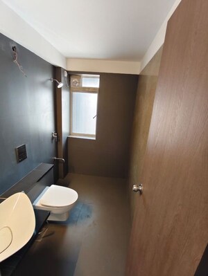 Bathroom in 2 BHK Apartment at Paradise Sai World Empire, Kharghar – for Rent