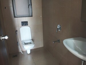 Bathroom in 2 BHK Apartment at Runwal Eirene, Balkum Pada – for Rent