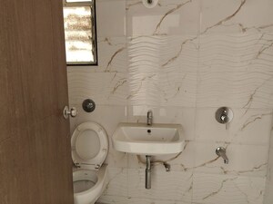 Bathroom in 3 BHK Apartment at Shapoorji Pallonji Vanaha Springs, Bavdhan – for Rent