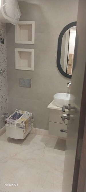 Bathroom in 3 BHK Builder Floor at Saraswati Vihar – for Sale