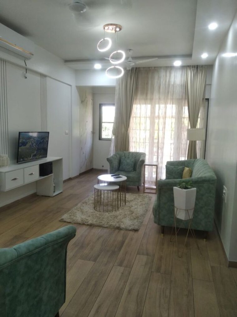 Living Room, ng-rathi-palm-nest 3 Bedroom 1000 Sq.Ft. Apartment In Wagholi Pune 10612668