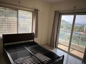 Bedroom in 3 BHK Apartment at Paranjape Forest Trails The Highlands, Bhugaon – for Rent