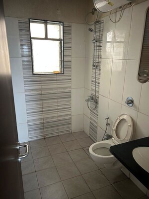 Bathroom in 3 BHK Apartment at Paranjape Forest Trails The Highlands, Bhugaon – for Rent