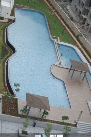 Staircase in 2 BHK Apartment at Pashmina Waterfront, Old Madras Road – for Rent
