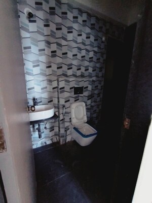 Bathroom in 1 BHK Apartment at Dhamji Shamji Mahavir Spring Tulip Phase 1, Pokhran Road No Two – for Rent