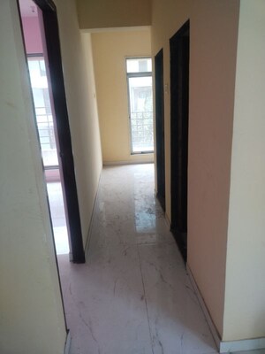 Building Lobby in 1 BHK Apartment at Dev Residency, Vadghar – for Rent