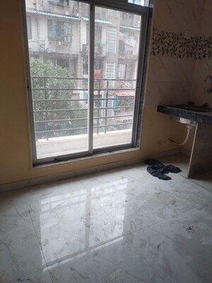 Room in 1 BHK Apartment at Dev Residency, Vadghar – for Rent