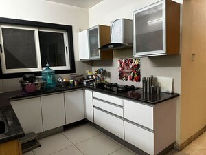 Kitchen in 2 BHK Apartment at Marvel Zephyr, Kharadi – for Rent