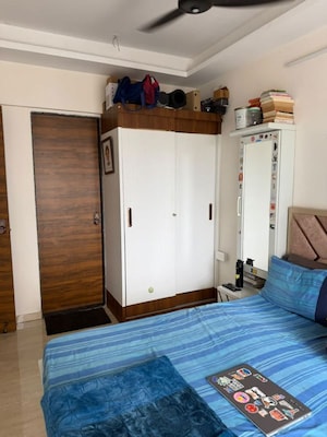 Bedroom in 2 BHK Apartment at Omkar Signet, Malad East – for Rent