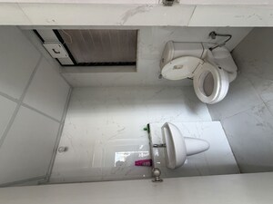 Bathroom in 2 BHK Apartment at Runwal Gardens, Dombivli East – for Rent