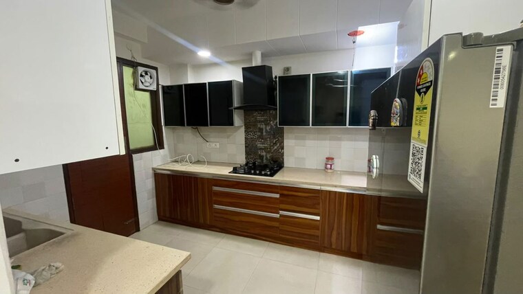 Kitchen, bptp-parklands 3 Bedroom 250 Sq.Yd. Builder Floor In Sector 76 Faridabad 10612933