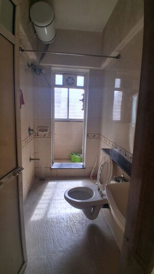 Bathroom in 1 BHK Apartment at K Raheja Heights, Malad East – for Rent