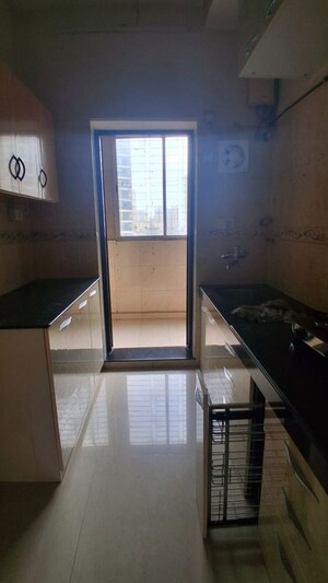 Kitchen in 1 BHK Apartment at K Raheja Heights, Malad East – for Rent