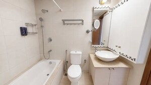 Bathroom in 3 BHK Apartment at Bhartiya Nikoo Homes, Thanisandra Main Road – for Sale