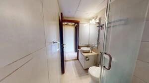 Bathroom in 3 BHK Apartment at Bhartiya Nikoo Homes, Thanisandra Main Road – for Sale