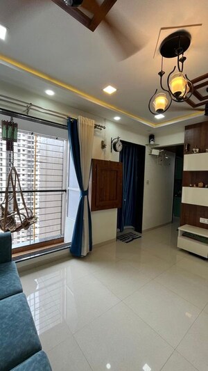 Living Room in 2 BHK Apartment at Runwal Eirene, Balkum Pada – for Sale