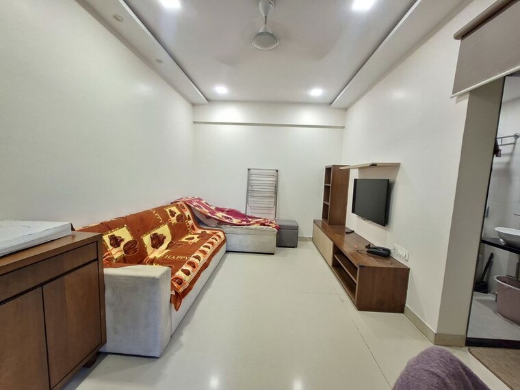 Living Room, lodha-casa-royale 1 Bedroom 450 Sq.Ft. Apartment In Balkum Pada Thane 10613146