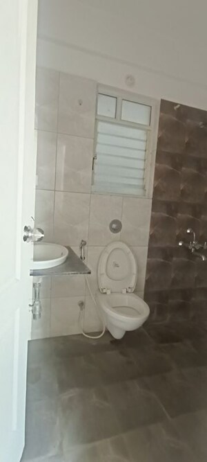 Bathroom in 2 BHK Apartment at Kolte Patil Cilantro, Wagholi – for Rent