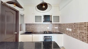 Kitchen in 2 BHK Apartment at Bhartiya Nikoo Homes, Thanisandra Main Road – for Sale