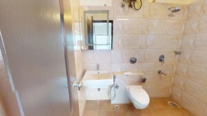 Bathroom in 2 BHK Apartment at Bhartiya Nikoo Homes, Thanisandra Main Road – for Sale