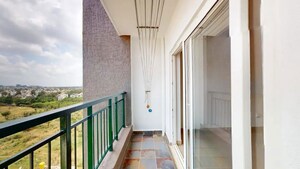 Balcony in 2 BHK Apartment at Bhartiya Nikoo Homes, Thanisandra Main Road – for Sale